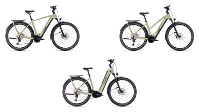 Se pueden ver tres bicicletas eléctricas Cube Kathmandu Hybrid blancas, cada una con un cuadro diamante, un cuadro trapezoidal y un cuadro de entrada baja