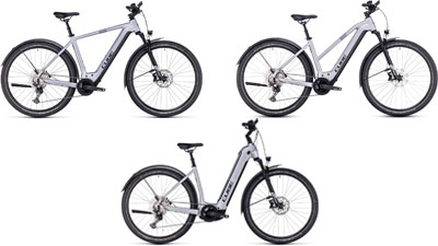 Se pueden ver tres bicicletas eléctricas Cube Nuride Hybrid blancas, cada una con un cuadro diamante, un cuadro trapezoidal y un cuadro de entrada baja