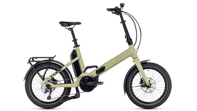 Se puede ver una bicicleta eléctrica Cube Fold Hybrid 500 de color beige.