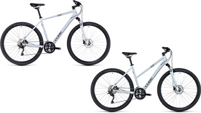 Dos bicicletas Cube Nature Pro con cuadro diamante y cuadro trapezoidal.
