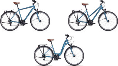 Tres bicicletas Cube Touring One una al lado de la otra: una con cuadro diamante, otra con cuadro trapezoidal y otra con cuadro bajo.